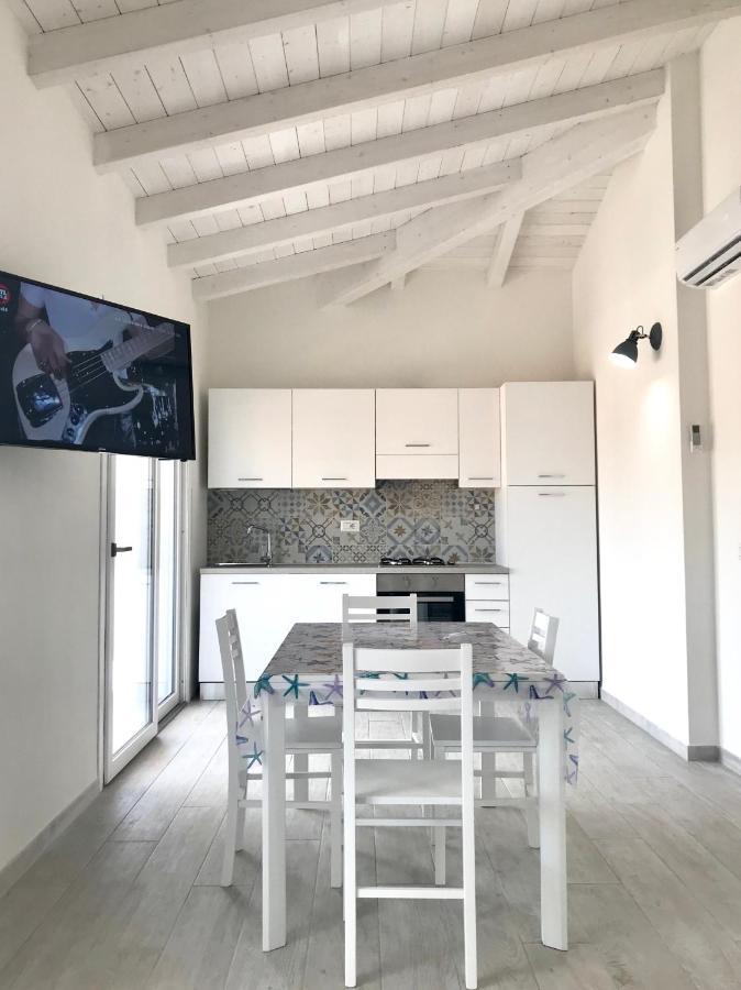 Case Vacanze "Bianco Mare" Porto Pino Exterior foto