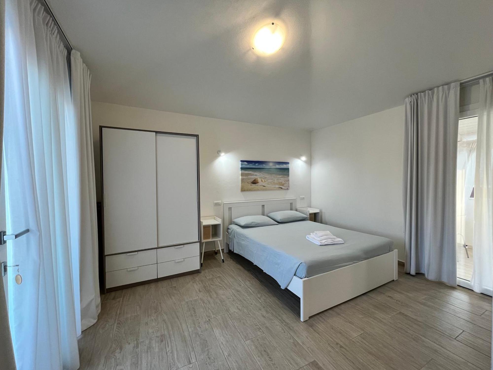 Case Vacanze "Bianco Mare" Porto Pino Exterior foto