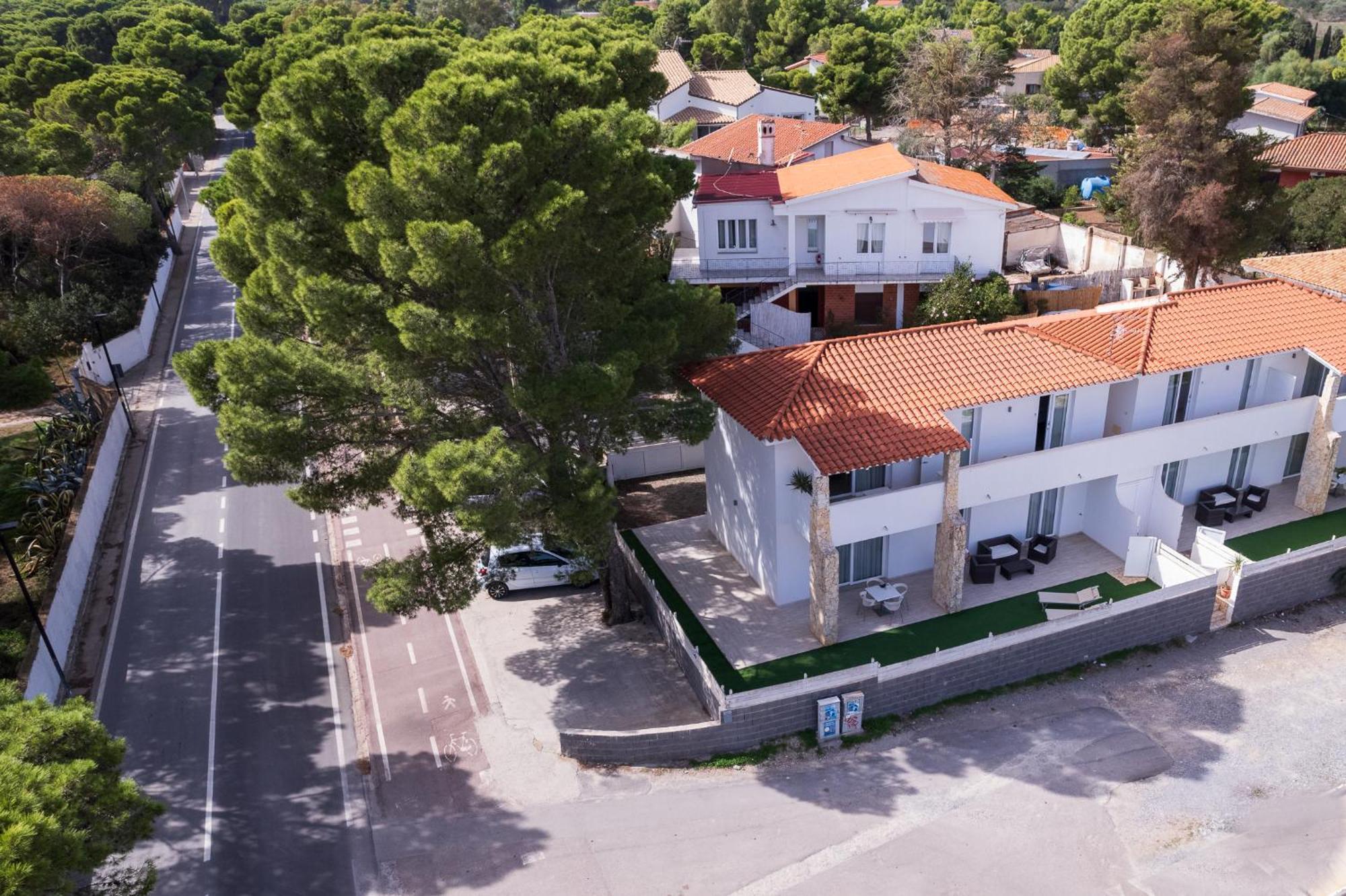 Case Vacanze "Bianco Mare" Porto Pino Exterior foto
