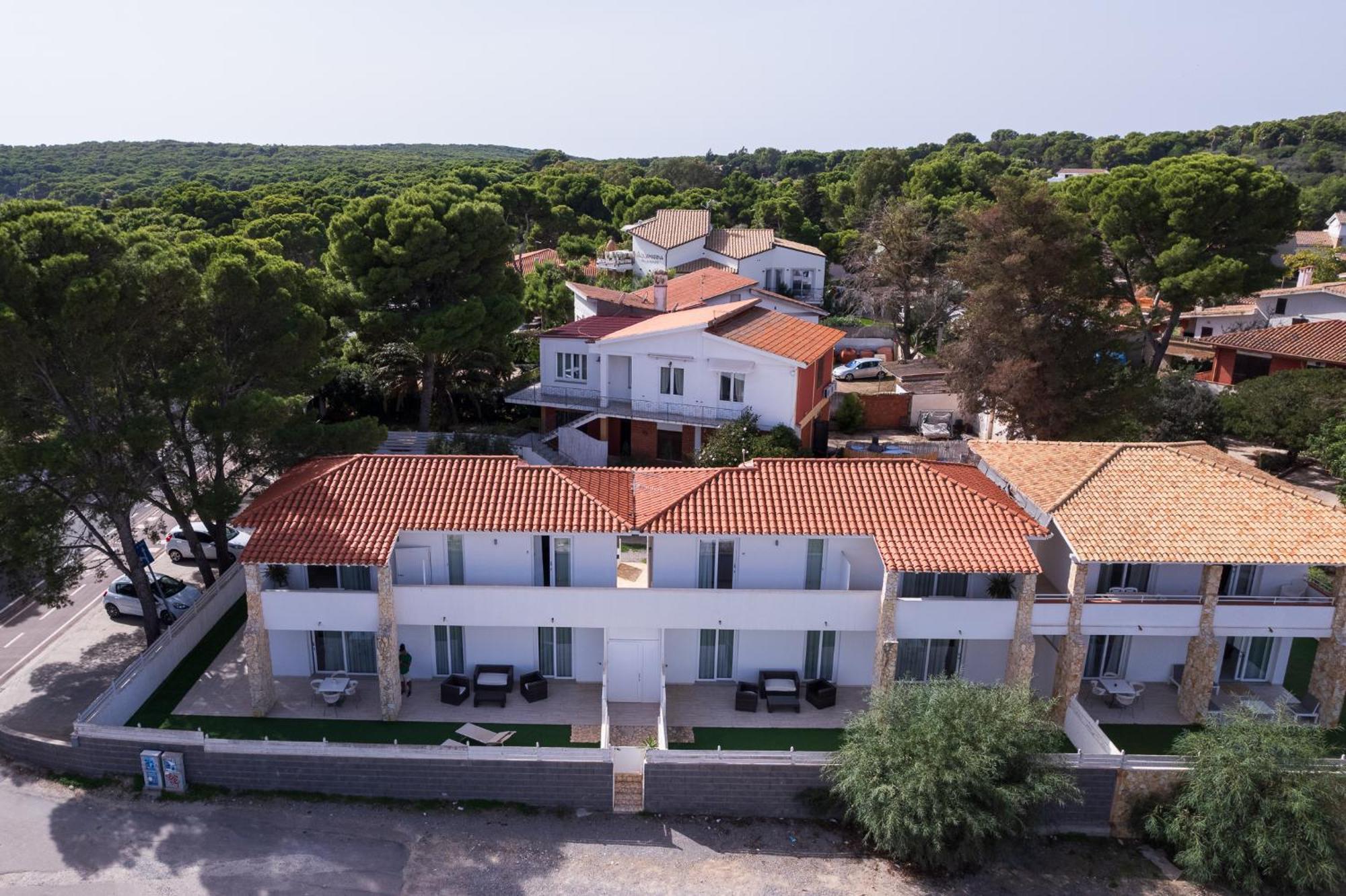Case Vacanze "Bianco Mare" Porto Pino Exterior foto