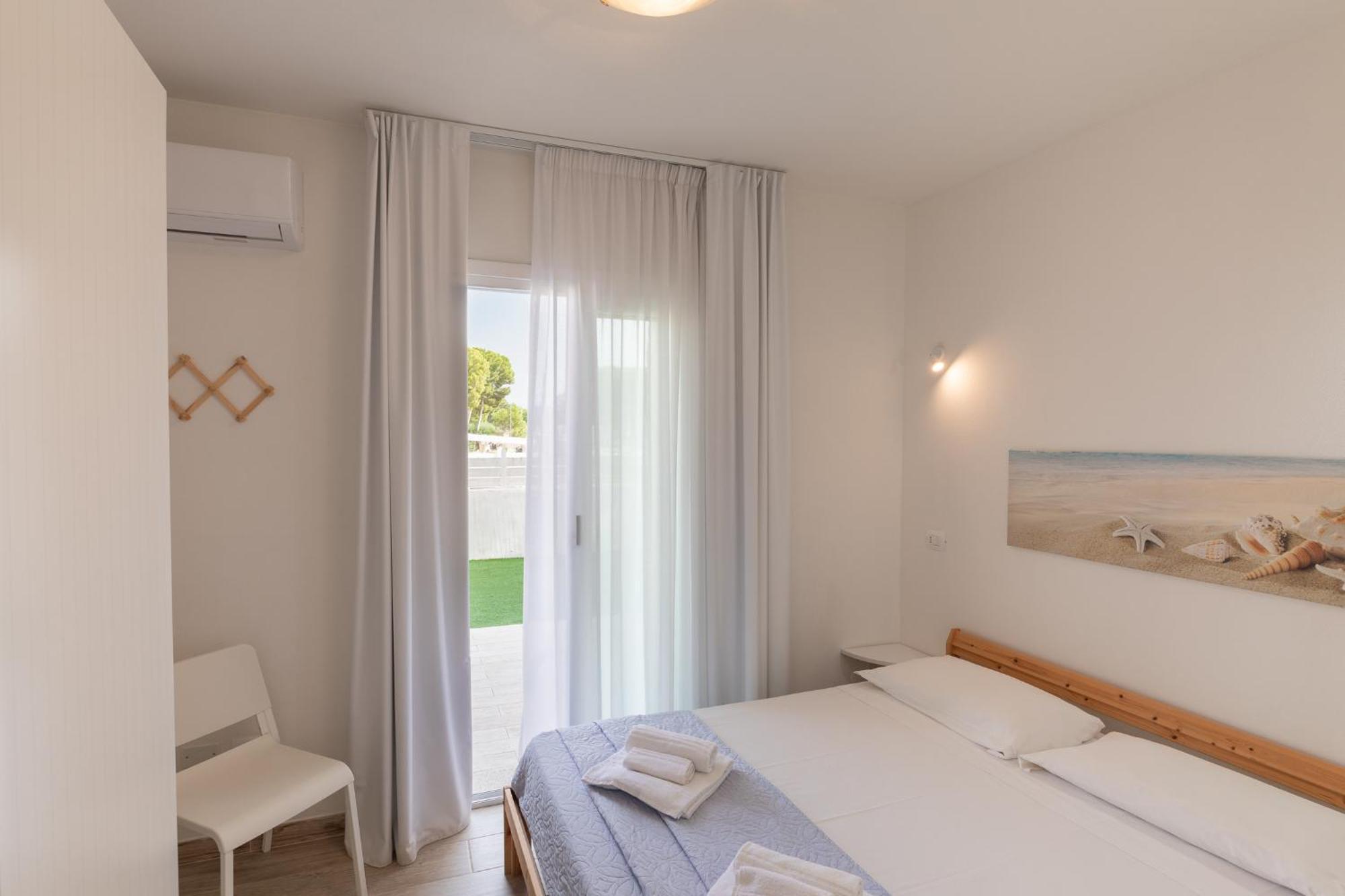 Case Vacanze "Bianco Mare" Porto Pino Zimmer foto