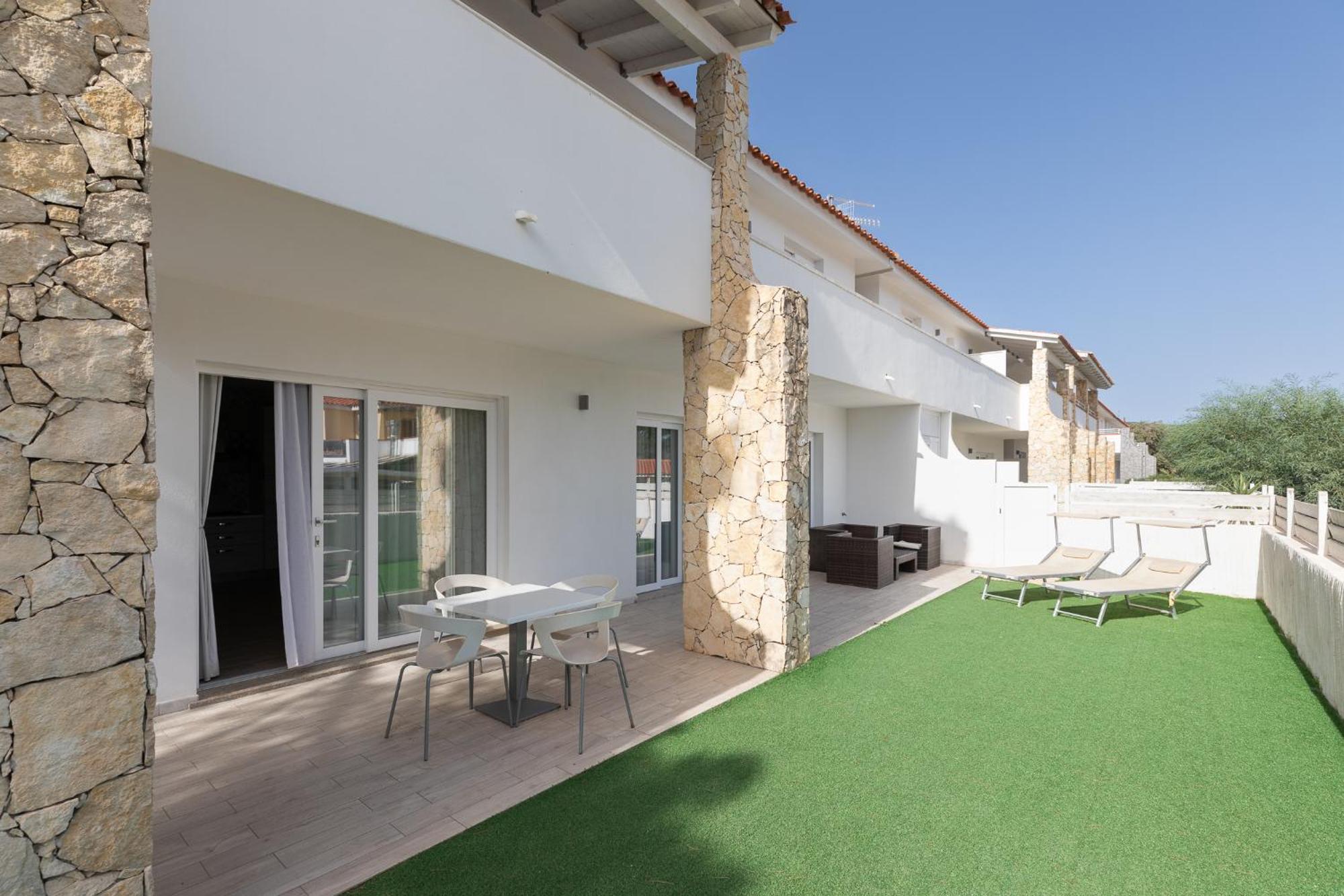 Case Vacanze "Bianco Mare" Porto Pino Exterior foto