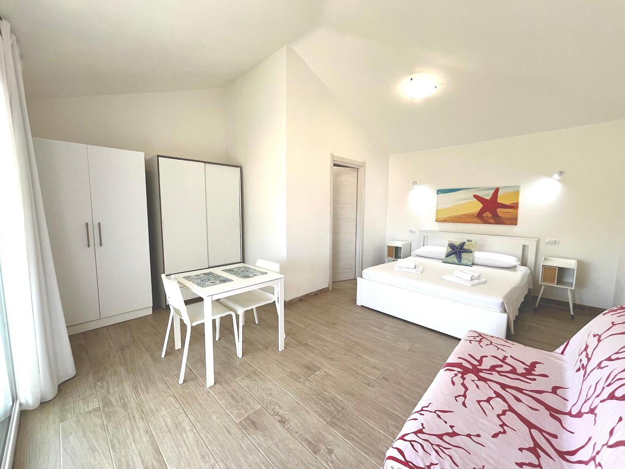 Case Vacanze "Bianco Mare" Porto Pino Exterior foto